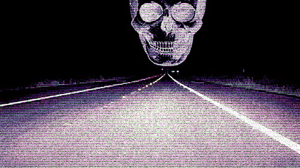A staticky skull looming over the horizon of a road at night.  The road stretches into the featureless distance.