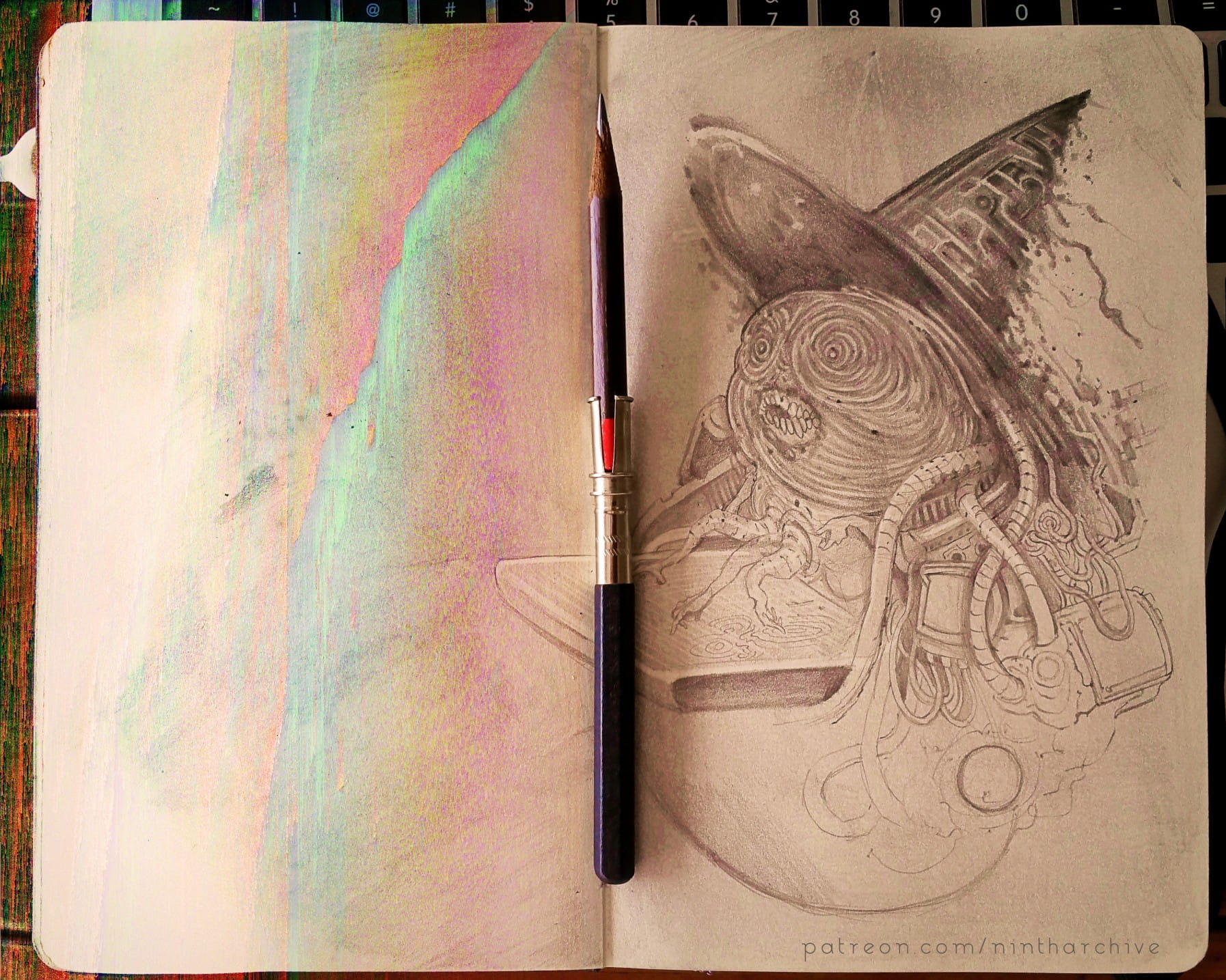 Open sketchbook with a pencil the crease between pages, and an incomplete graphite-only drawing of the glitch witch on the right page.  A rainbow-like gradient is on the left page.