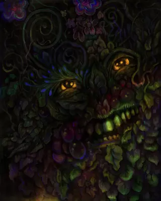 A face made of leaves, plant tendrils, and fronds with glowing eyes.